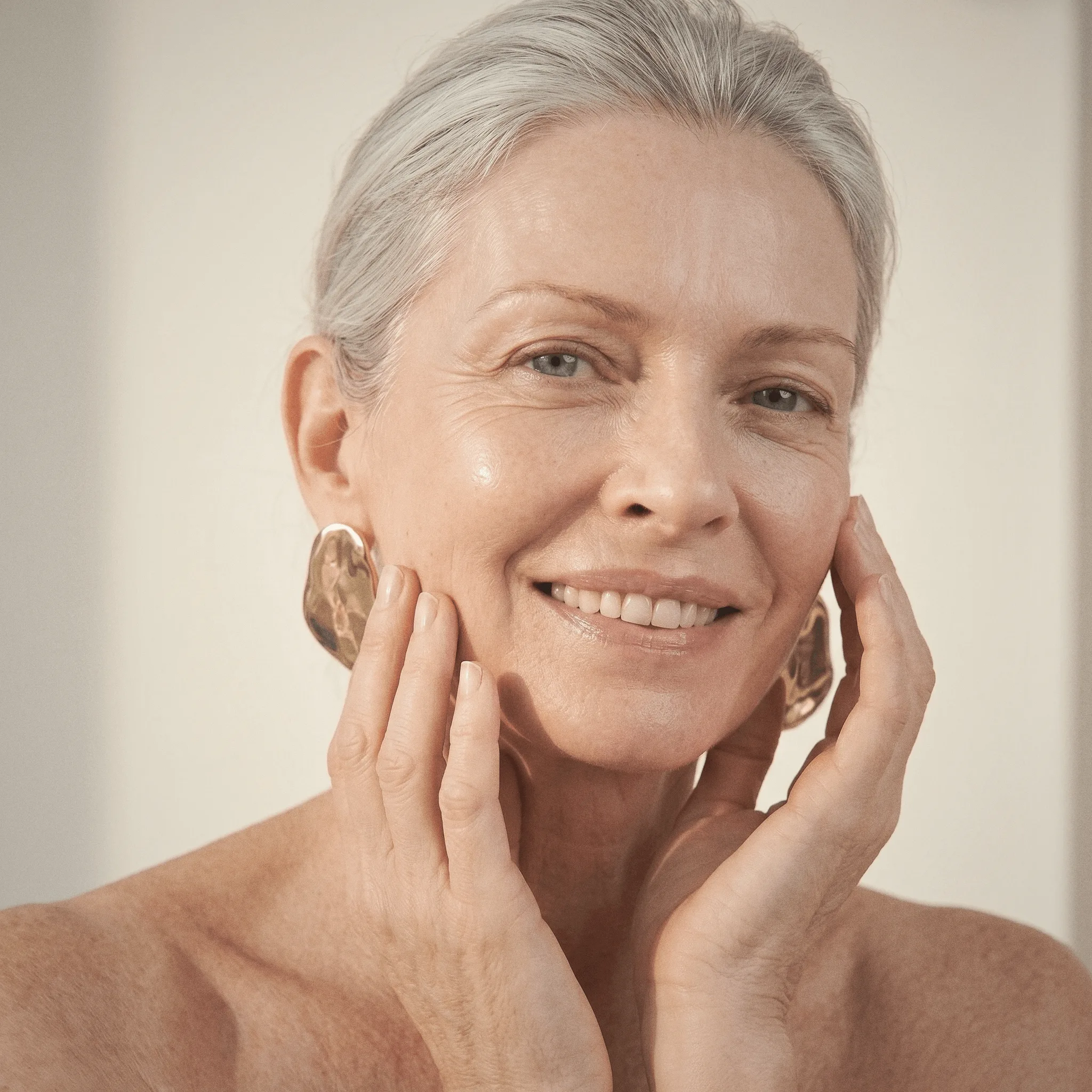 Radiant mature woman after using Kisuva PDRN Serum
